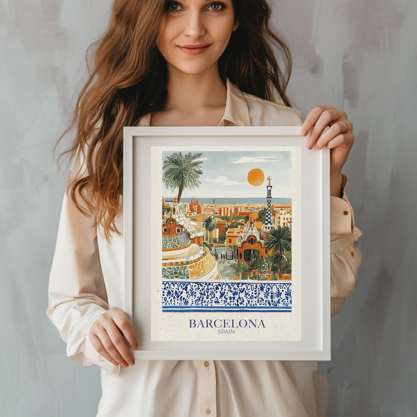 Woman holding a framed print of Barcelona with a scenic view.