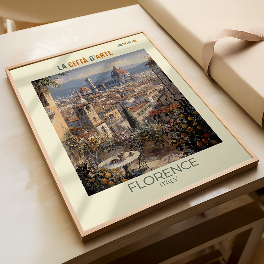 Framed artwork of Florence, Italy with 'La Città d'Arte' text on a wooden surface.