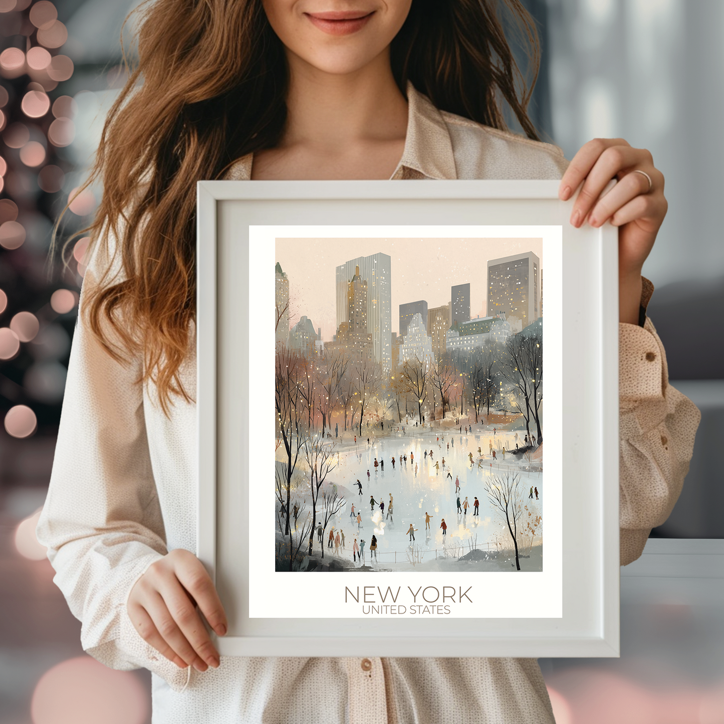 Person holding a framed picture of New York with blurred Christmas lights in the background