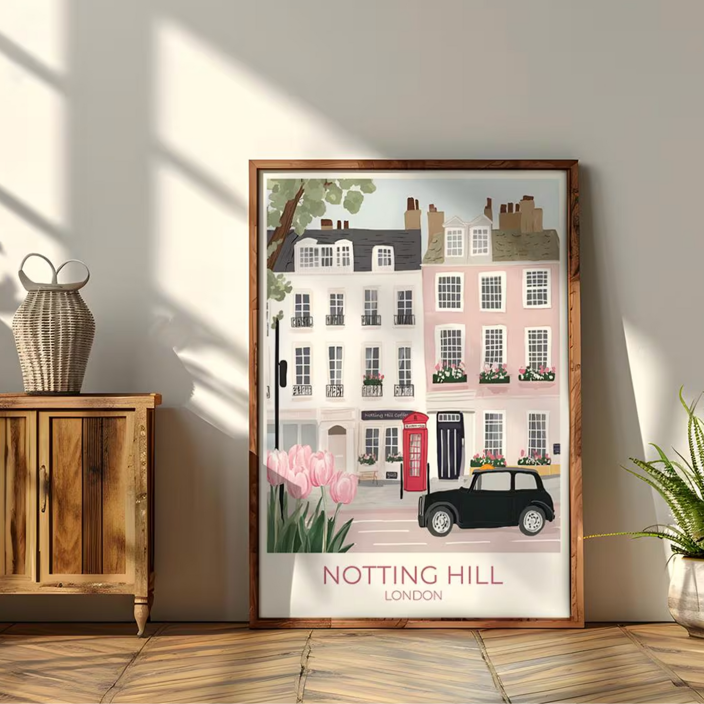 An illustration of a charming street in Notting Hill, London, featuring pastel-colored townhouses with flower boxes, a red British telephone booth, a black vintage car, and blooming pink tulips in the foreground. The text 'NOTTING HILL LONDON' appears at the bottom.