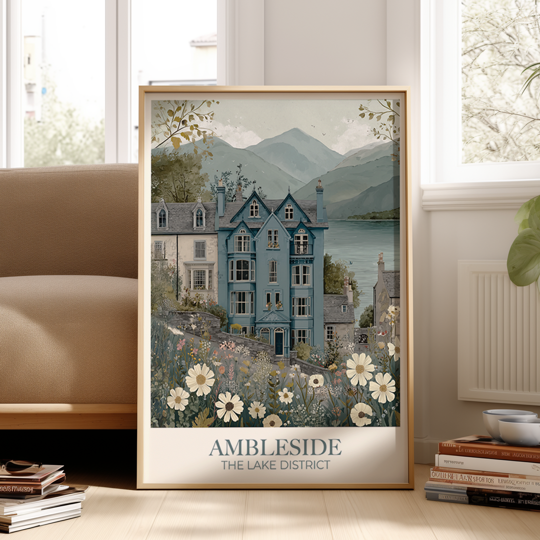 Framed artwork of a scenic house with mountains in a living room setting