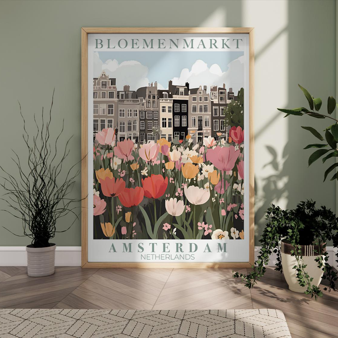 Framed poster of Bloemenmarkt Amsterdam with flowers and buildings in a room with plants.