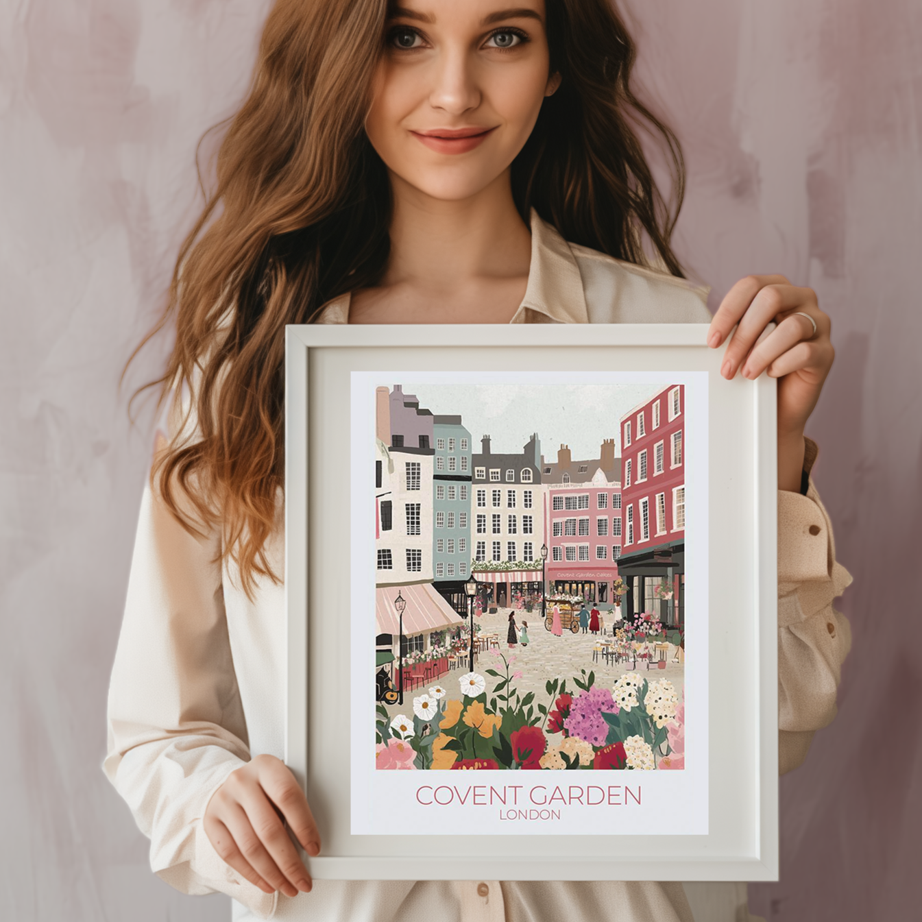 Framed illustration of Covent Garden, London, showing a vibrant market scene with colorful buildings, flower stalls, and people. The print hangs above a wooden dining table set with kitchenware, with white subway tiles and shelves in the background. Text on the print reads 'COVENT GARDEN LONDON'.