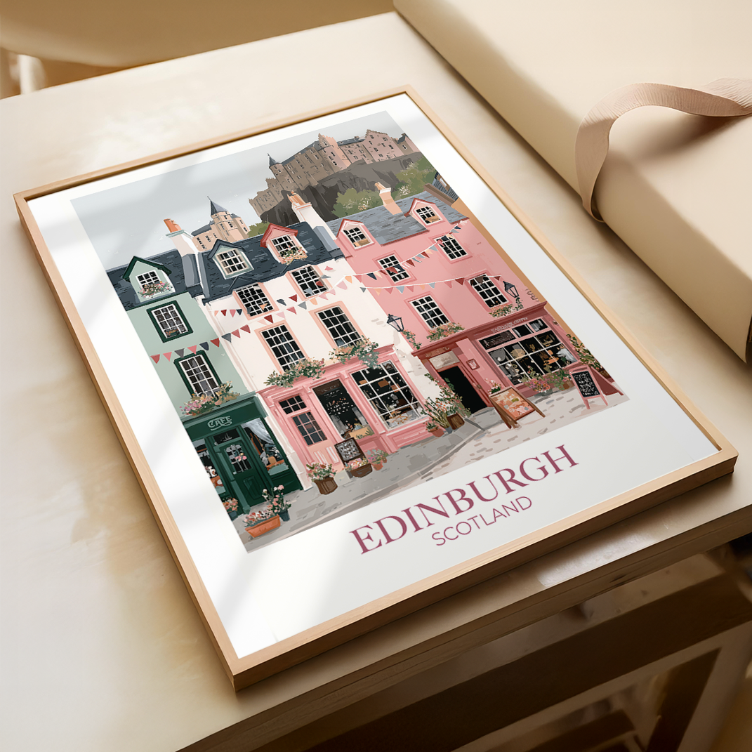 Framed artwork of Edinburgh, Scotland with colorful buildings on a table.