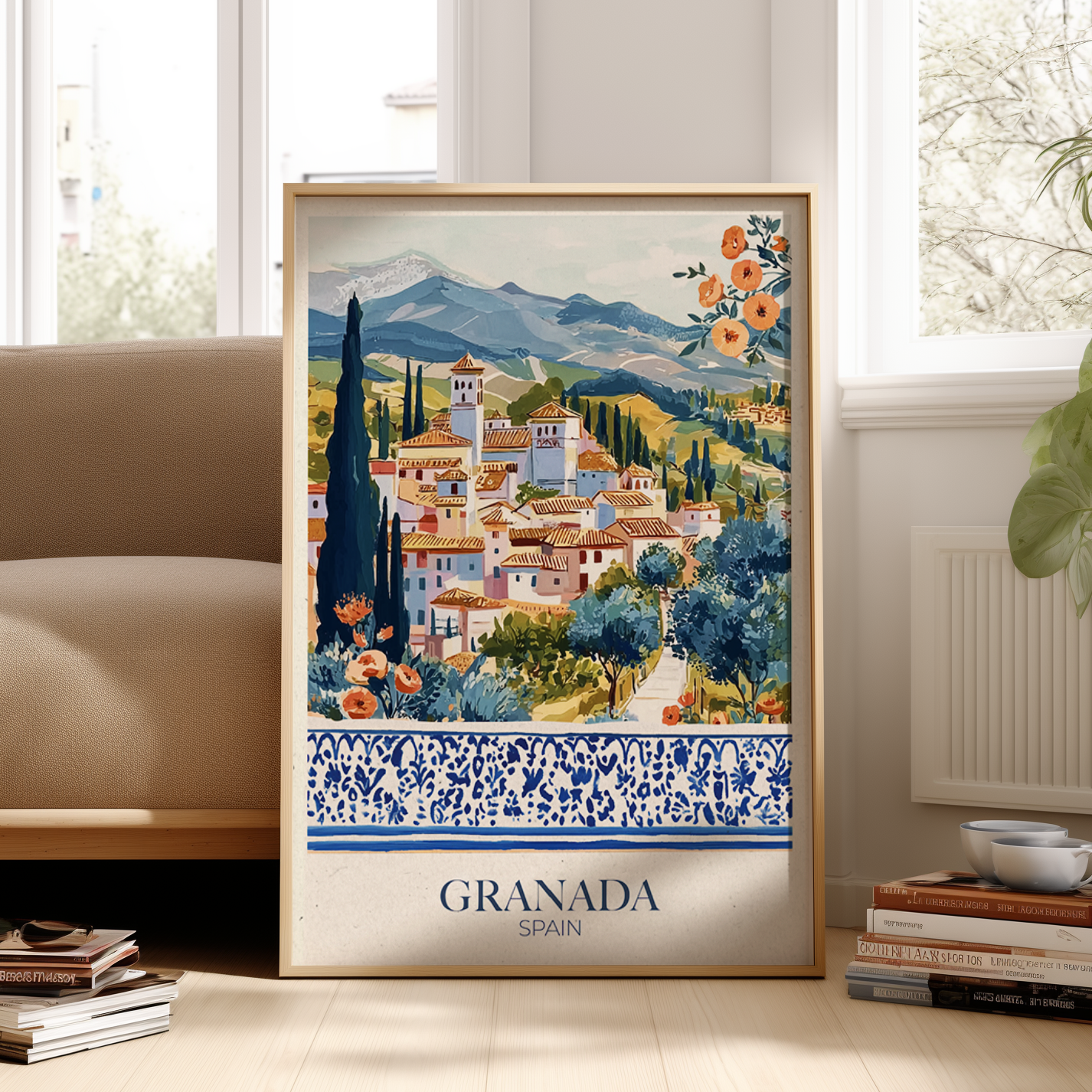Framed artwork of a scenic view with 'Granada Spain' text in a living room setting.