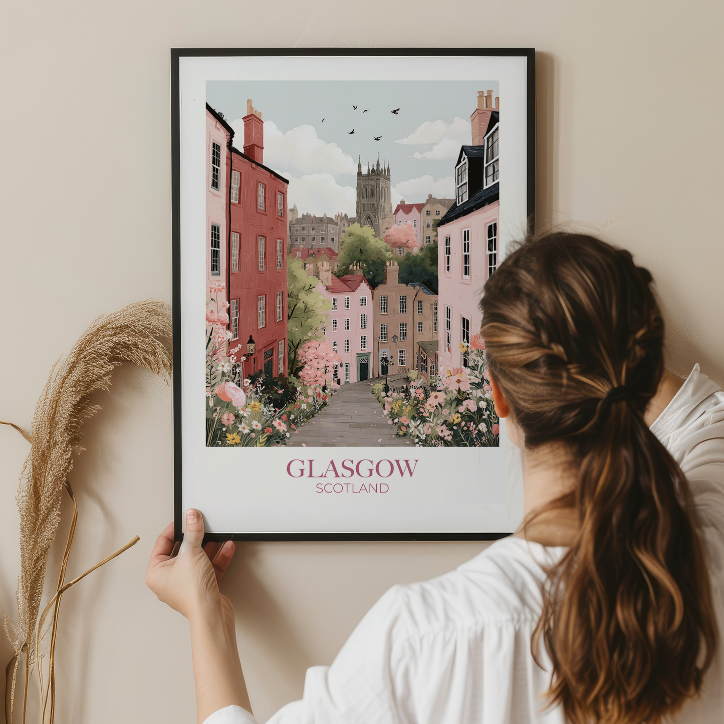 Person holding a framed print of Glasgow, Scotland