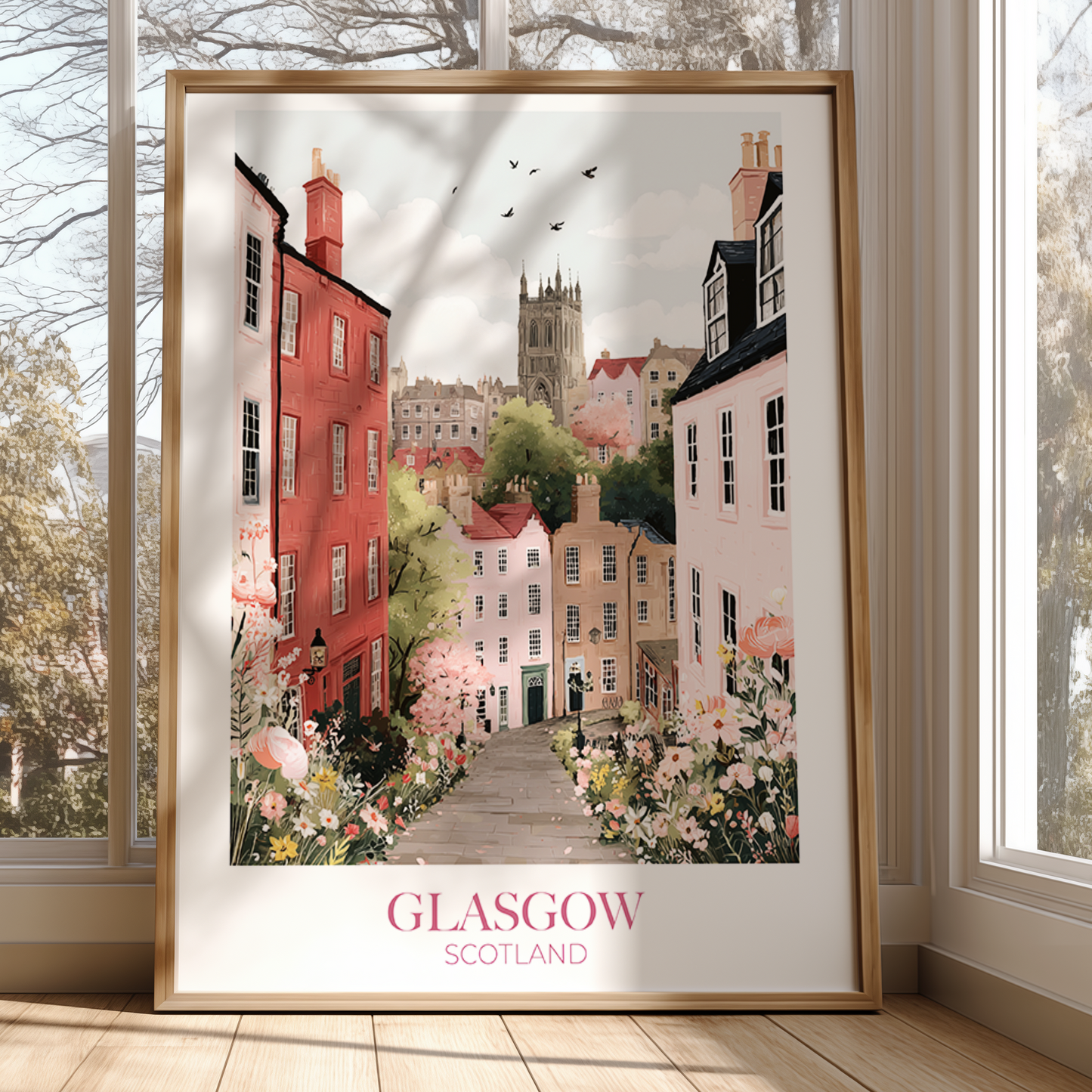 Framed artwork of a cityscape with 'Glasgow, Scotland' text in a room with large windows.