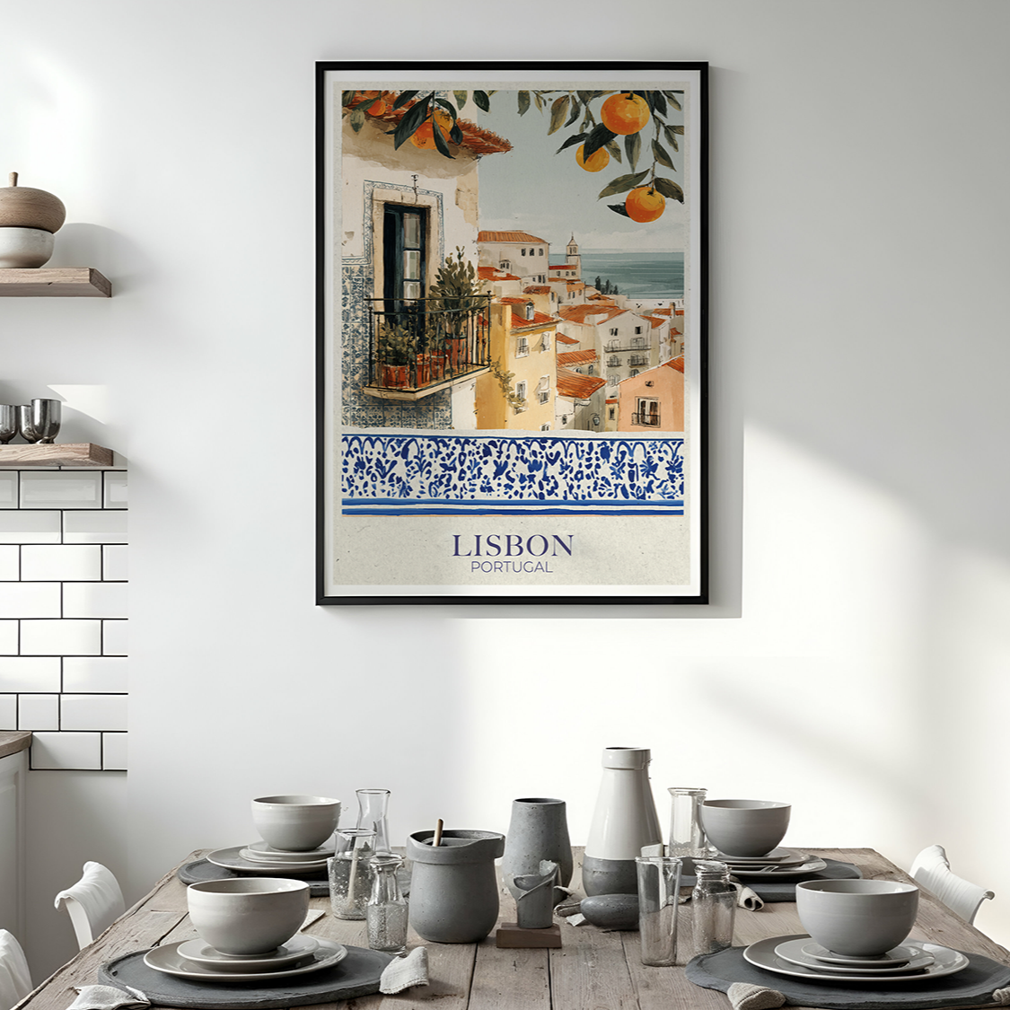 Kitchen interior with a Lisbon-themed wall art print above a dining table.