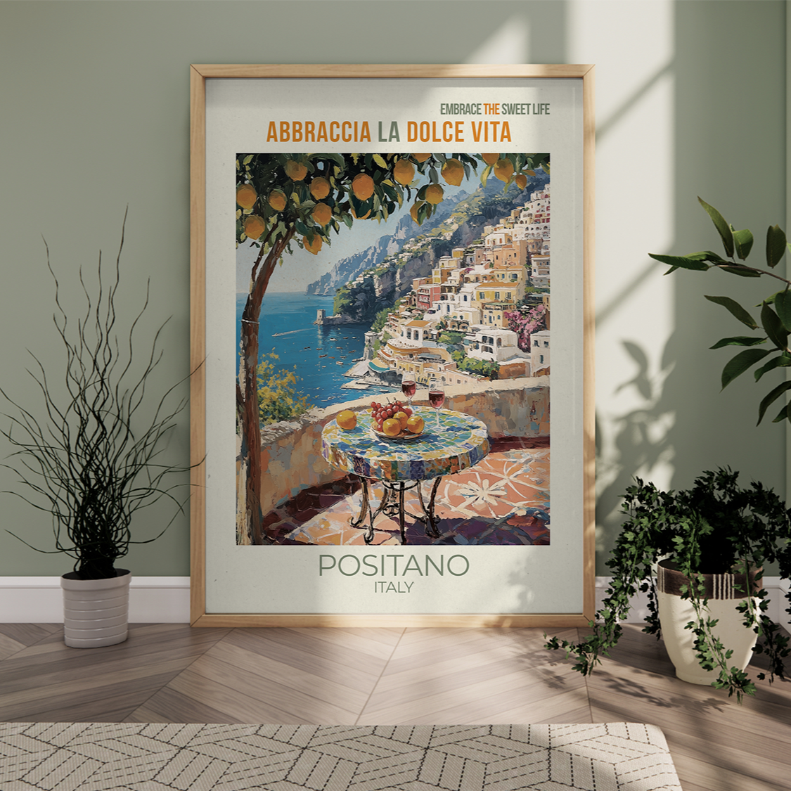Framed artwork of Positano, Italy with scenic view and text on a wall.
