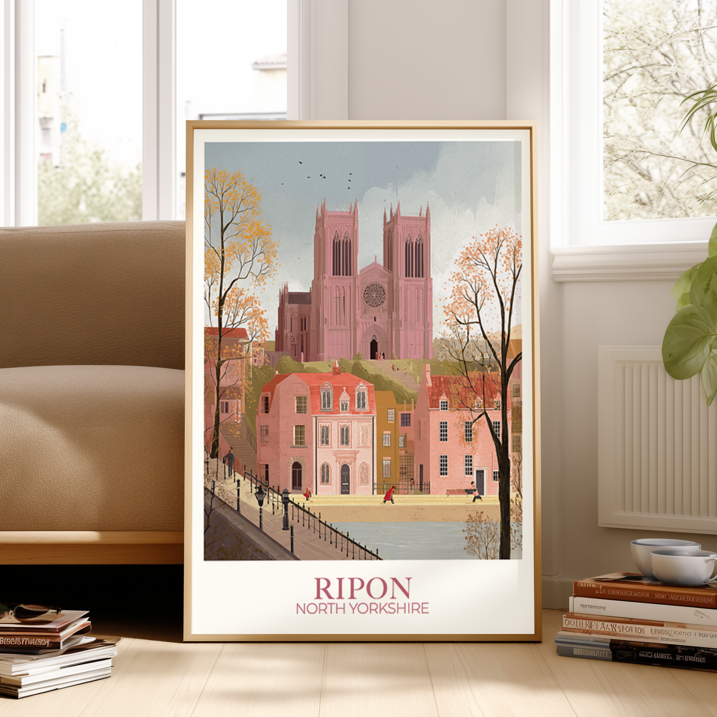 Framed poster of Ripon, North Yorkshire with a pink cathedral in a living room setting.