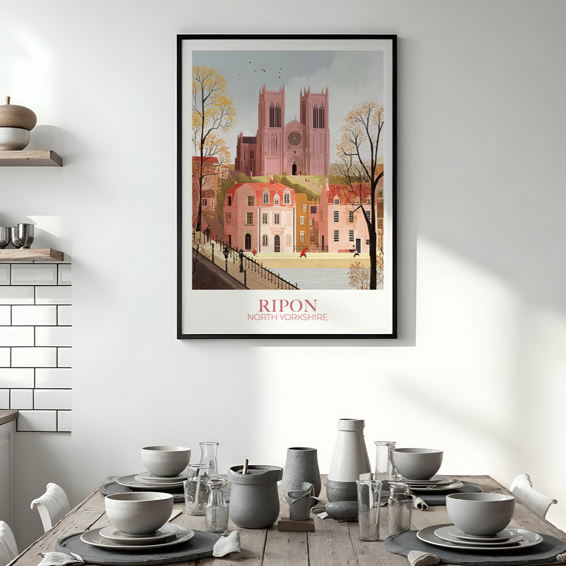 Framed artwork of Ripon on a wall above a dining table with kitchen decor.