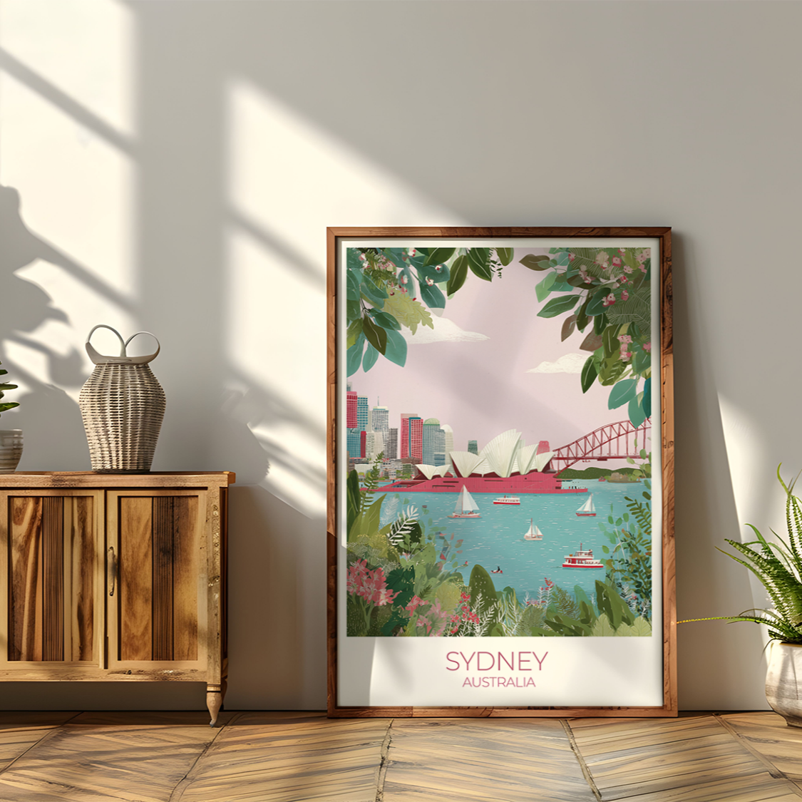 Framed artwork of Sydney on a wall with wooden cabinet and plants