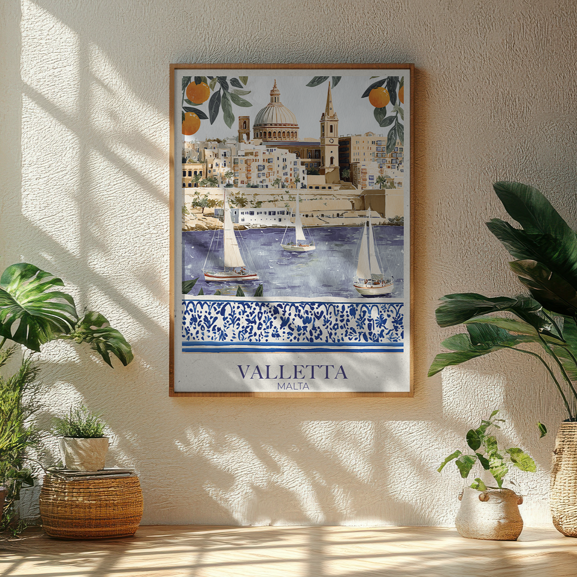 Framed artwork of Valletta, Malta, on a wall with plants around