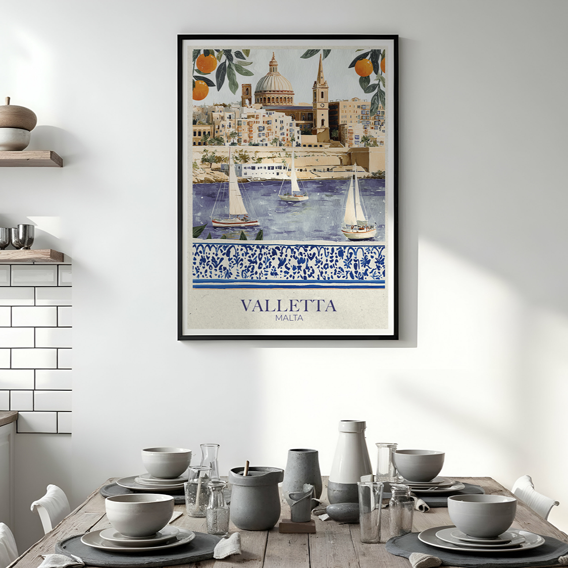 Framed artwork of a cityscape with 'Valletta' text in a kitchen setting.