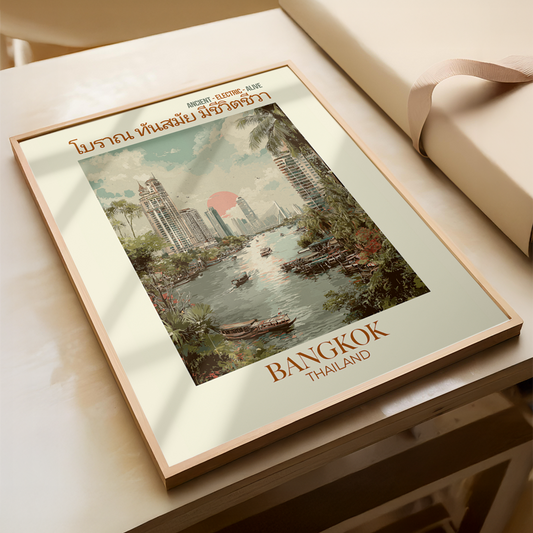Framed artwork of Bangkok, Thailand on a light wooden surface