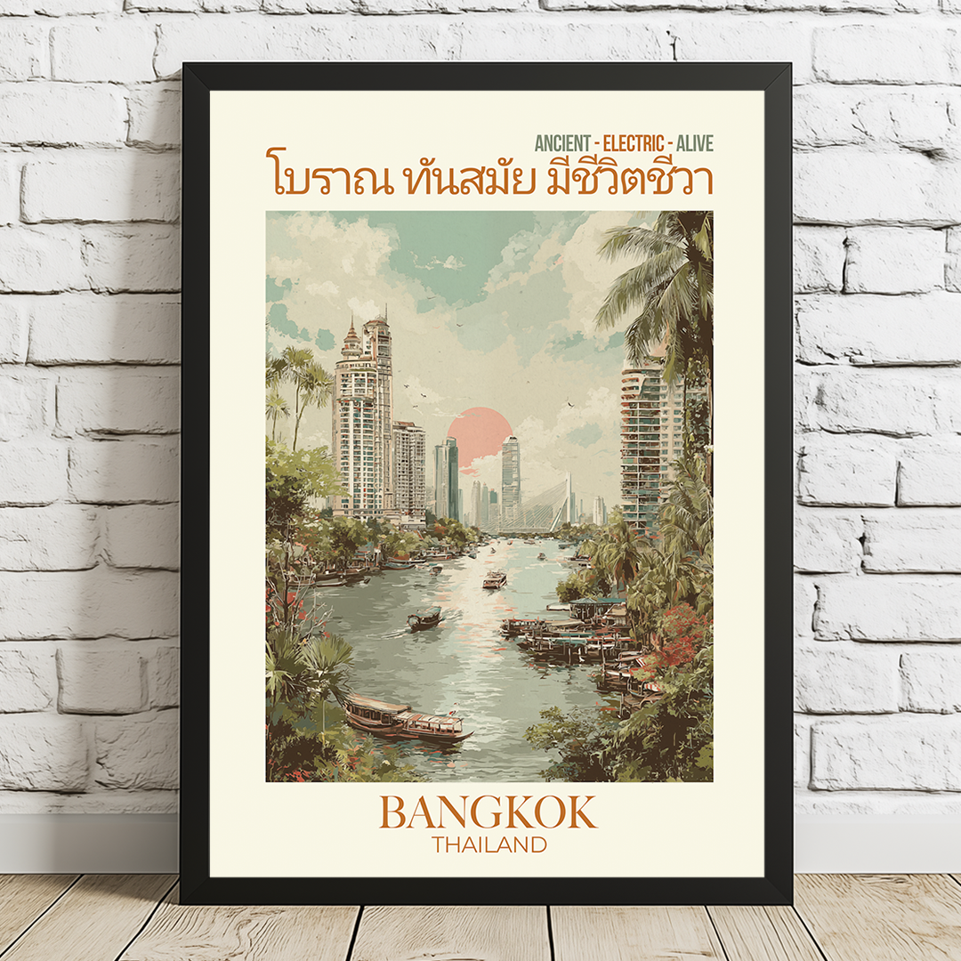 Framed poster of Bangkok with a river and skyline on a white brick wall.