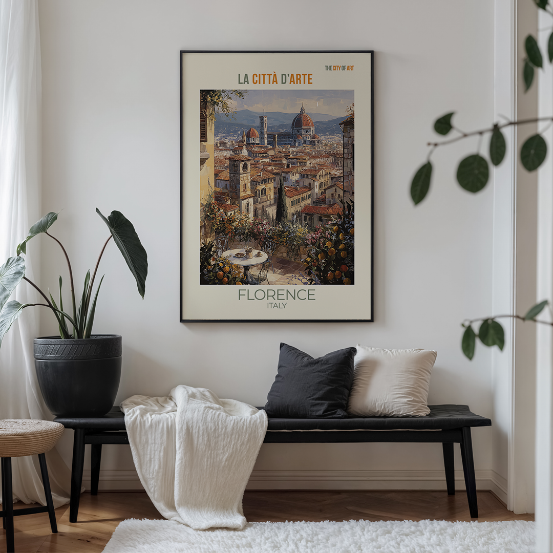 Framed poster of Florence on a wall above a bench with decorative pillows.