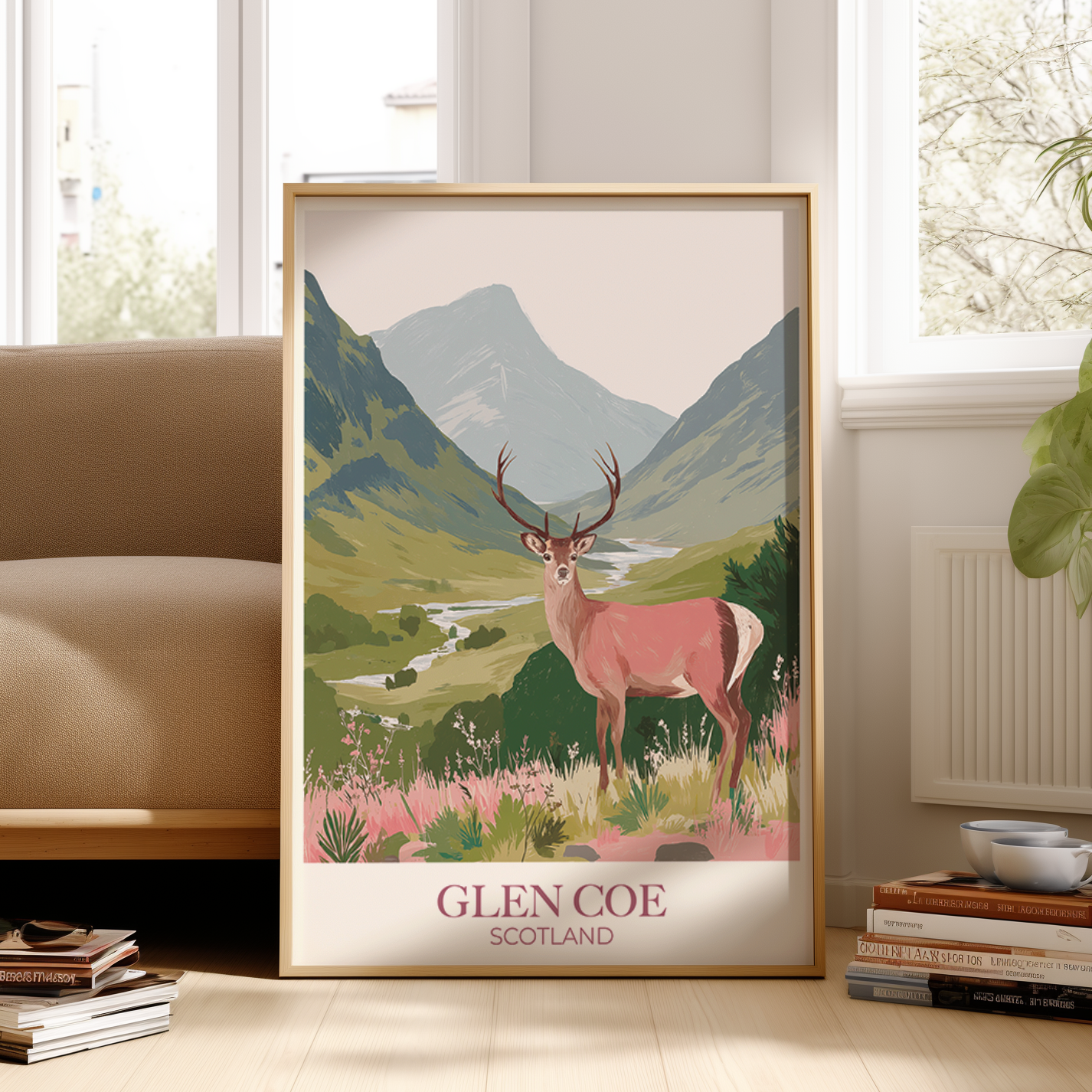 Framed poster of a deer in Glen Coe, Scotland, in a living room setting.