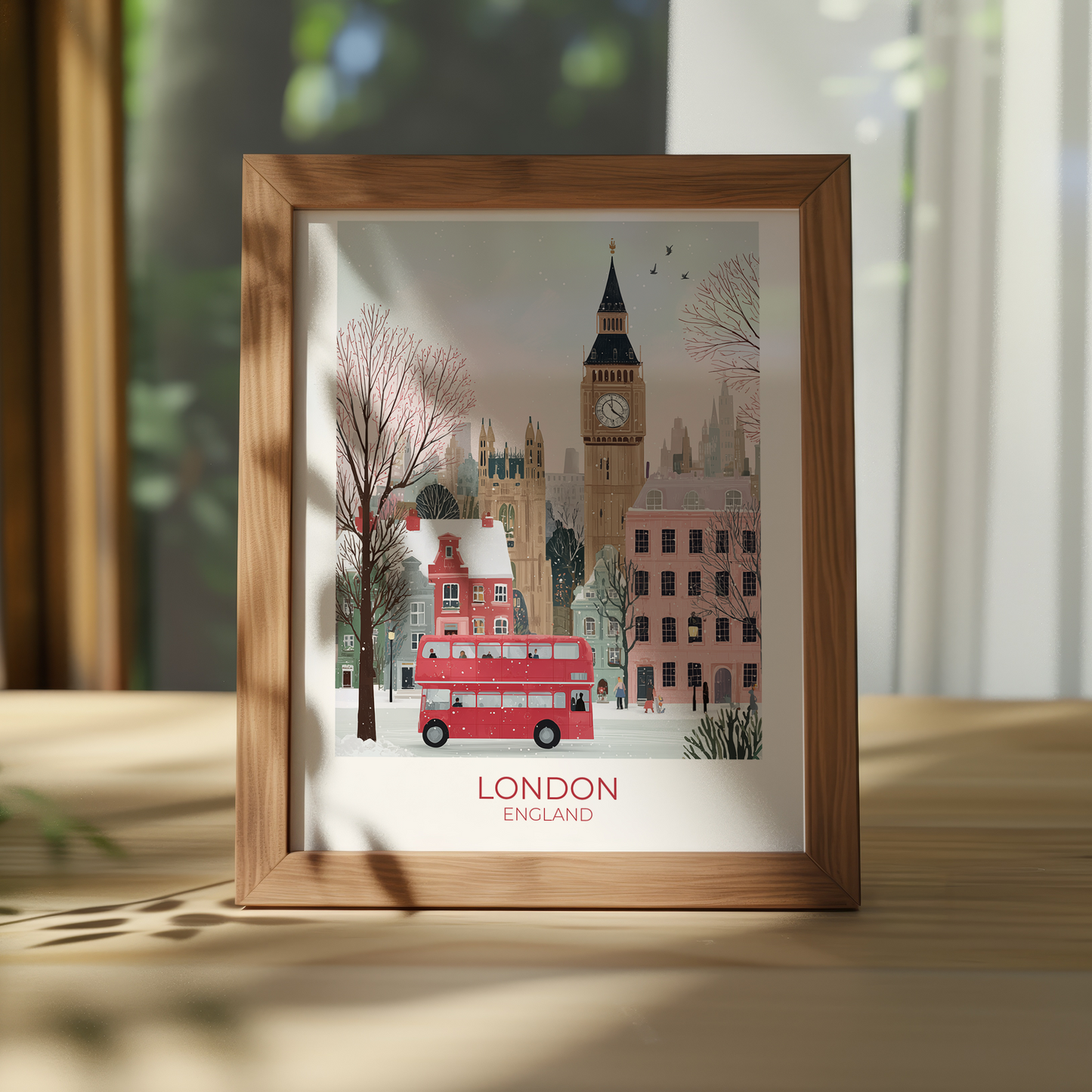 Framed artwork of London with Big Ben and a red bus on a light background