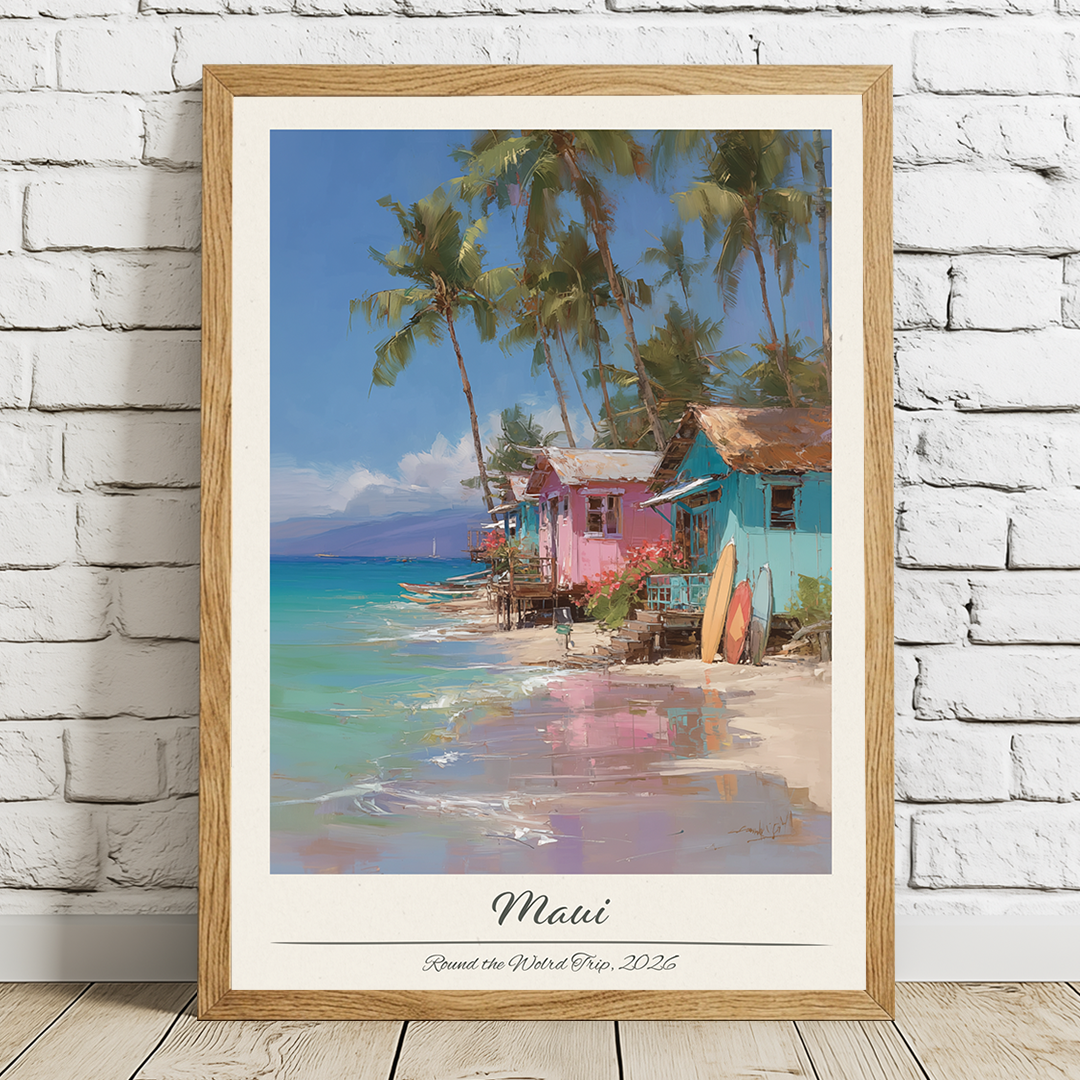 Framed artwork of a tropical beach scene with colorful houses and palm trees, titled 'Maui'.