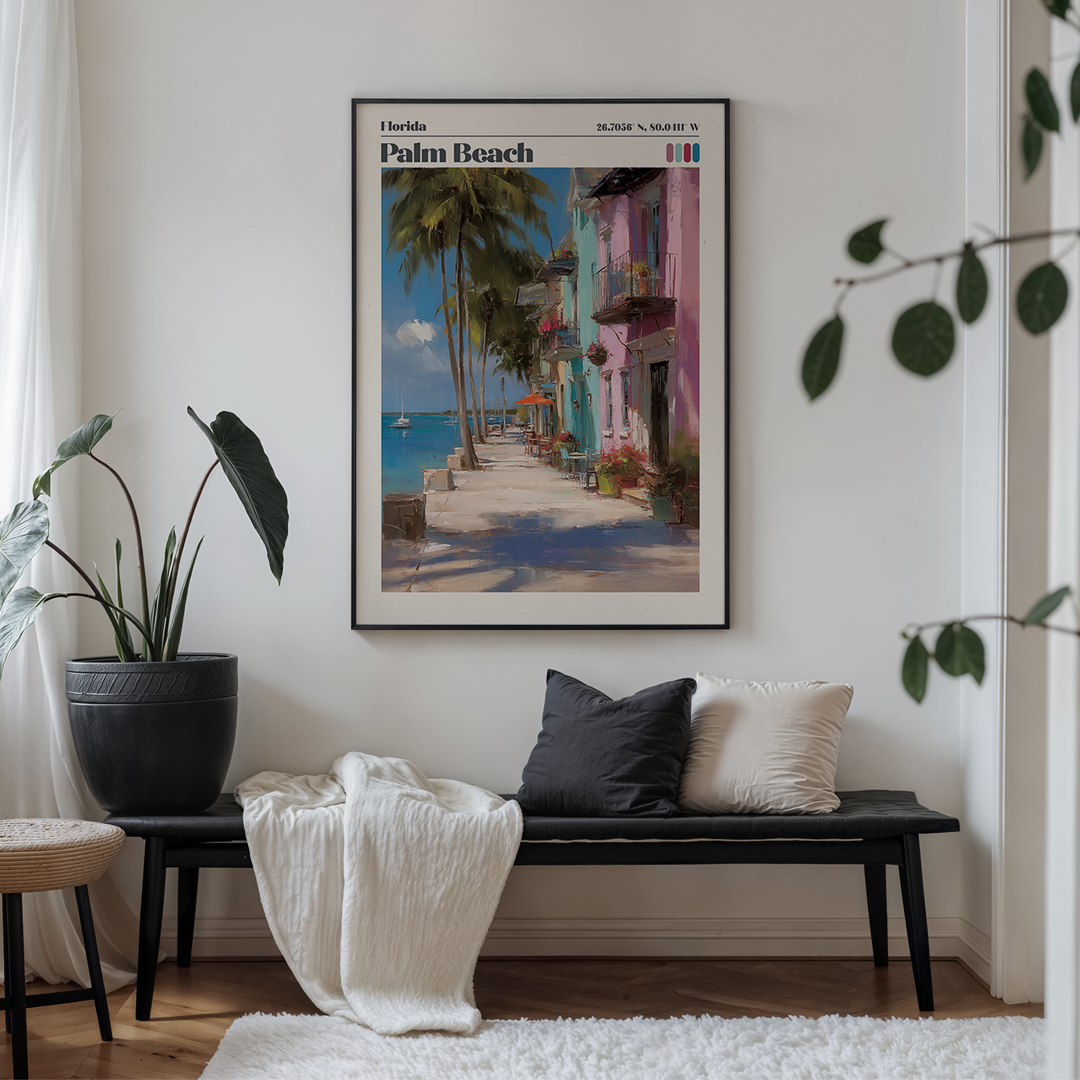 Living room with a framed poster of Palm Beach, Florida, above a bench with cushions.