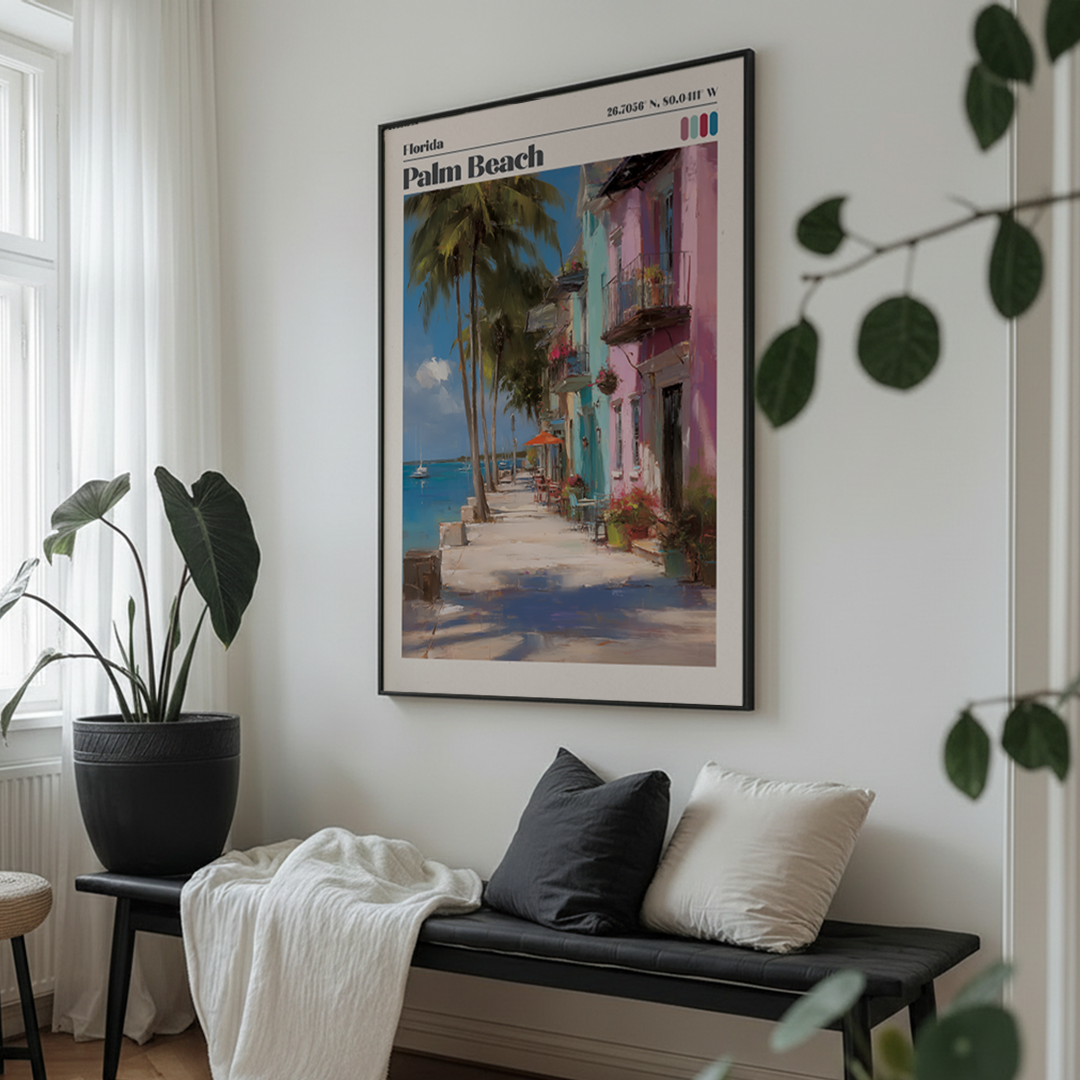 Framed artwork of a street scene with palm trees and buildings in a living room.