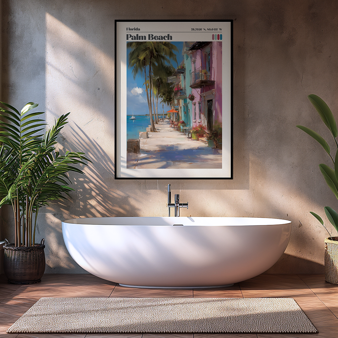 Modern bathroom with a freestanding bathtub, framed artwork of a beach scene, and plants.