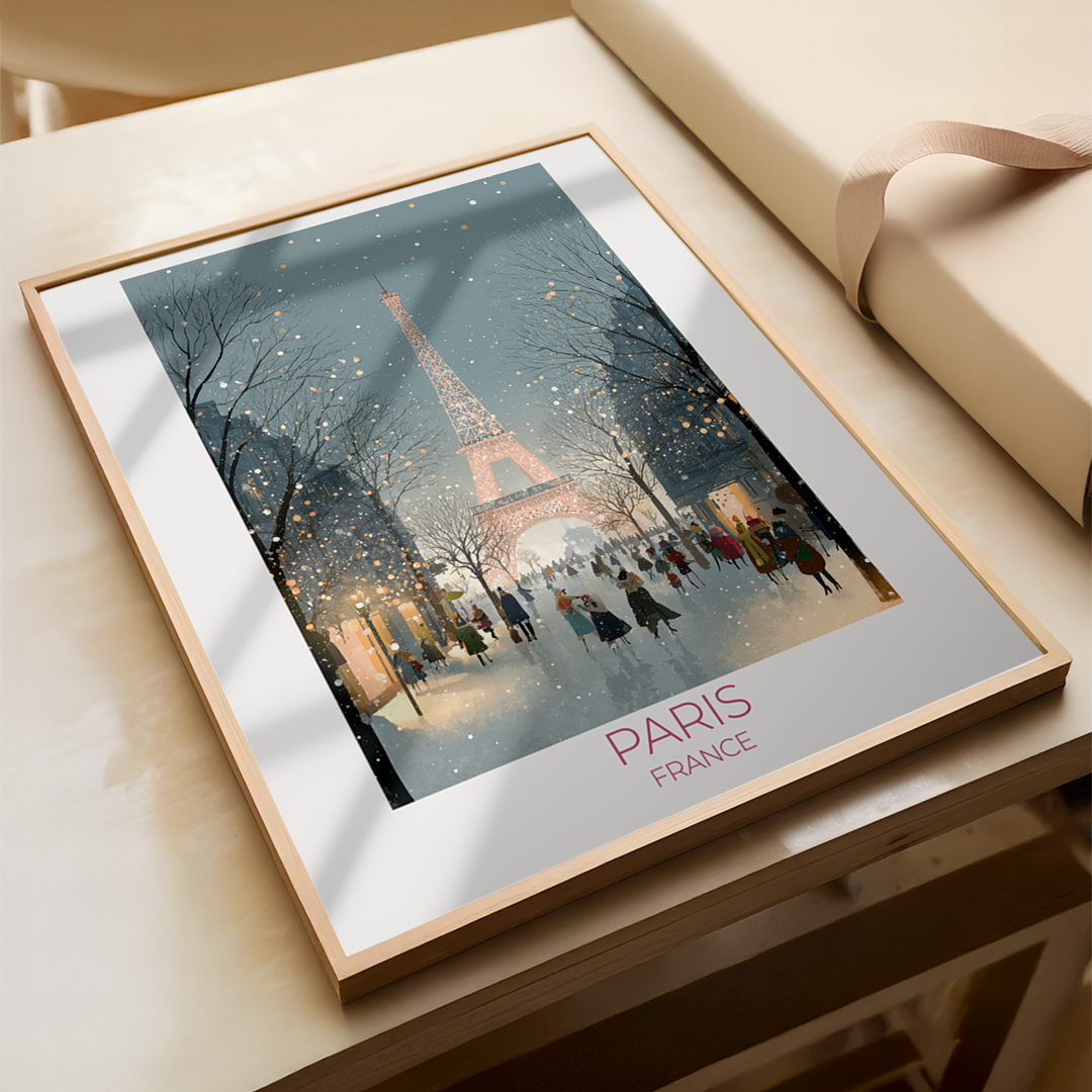 Framed artwork of the Eiffel Tower in Paris on a wooden surface