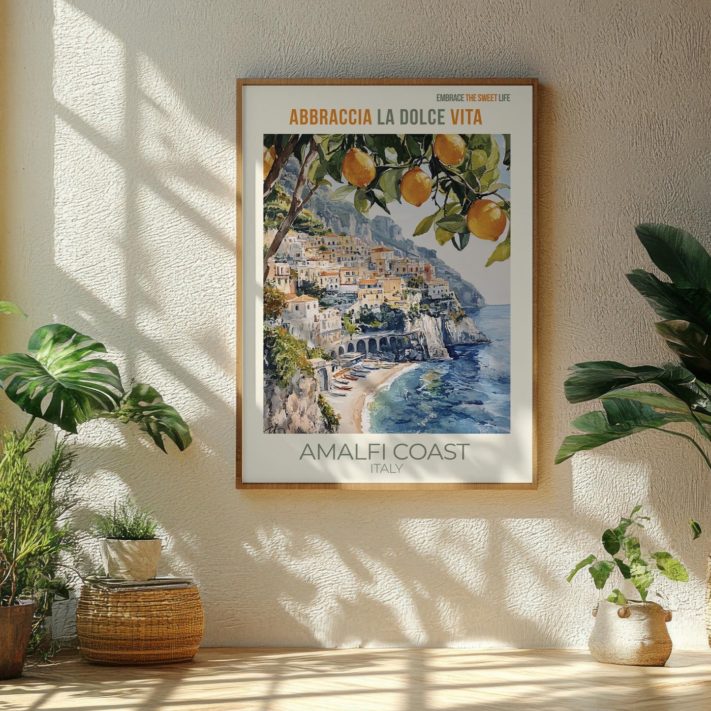 Framed poster of the Amalfi Coast with plants in the foreground