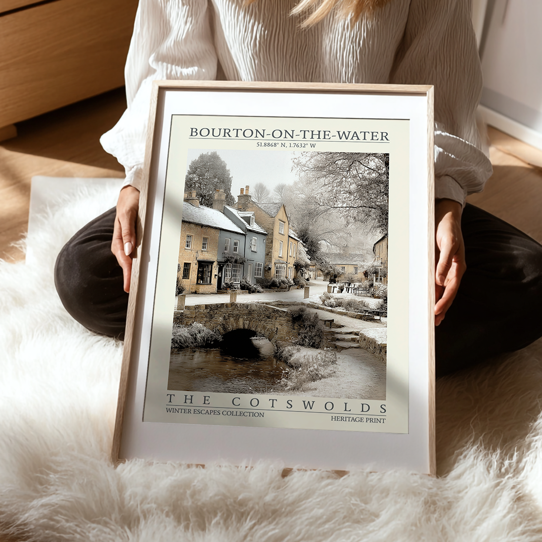 Person holding a framed print of Bourton-on-the-Water in The Cotswolds