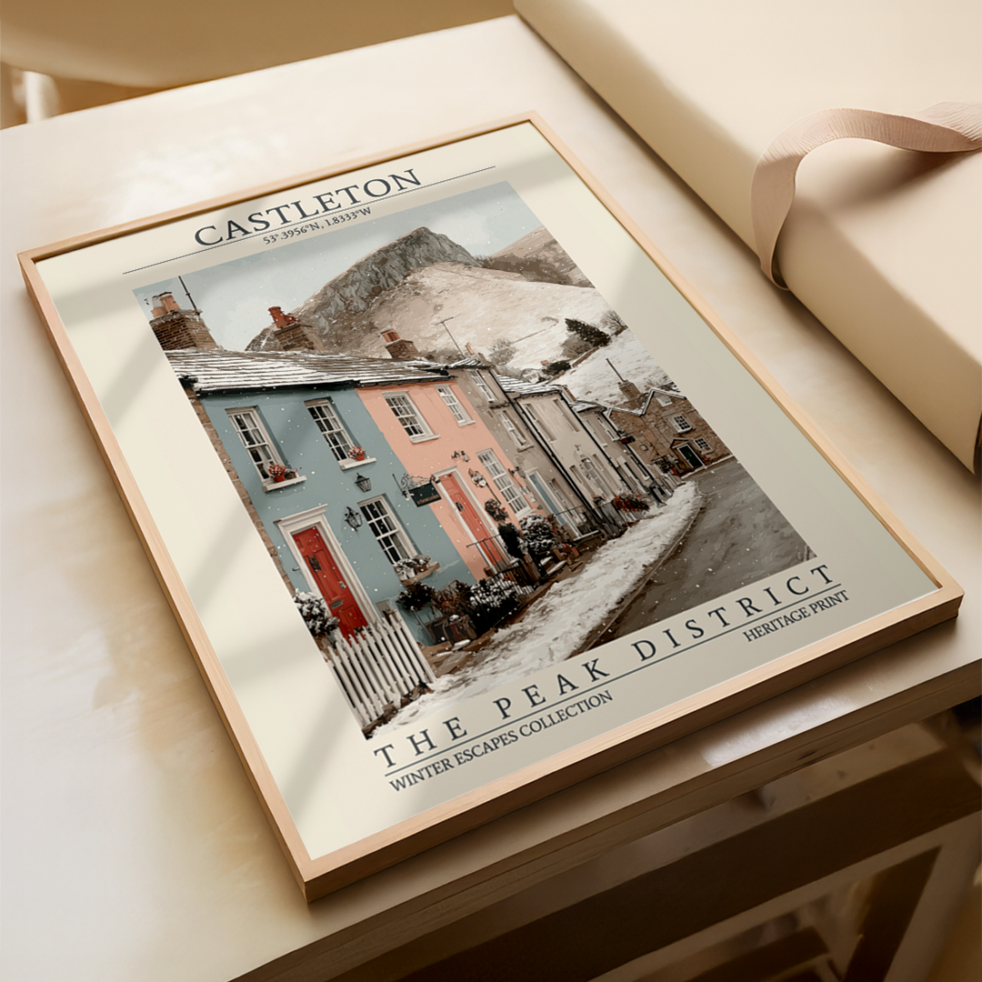 Framed artwork of a village scene with text 'Castleton' and 'The Peak District'.
