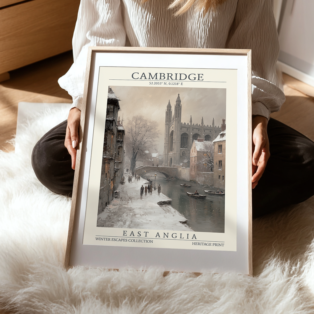 Person holding a framed print of Cambridge, East Anglia on a soft surface.