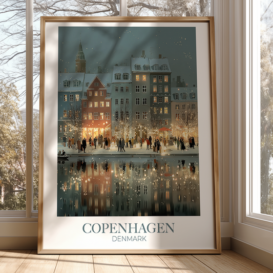 Framed artwork of a snowy street scene in Copenhagen, Denmark, on a wall.