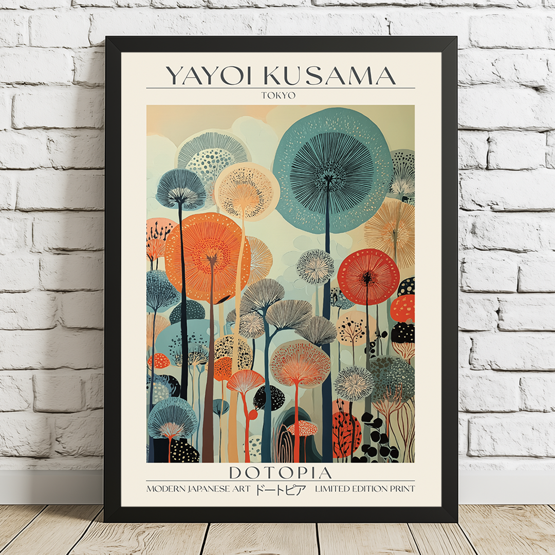 Framed Yayoi Kusama-inspired art print with colorful abstract dot and circle designs on a white brick wall.