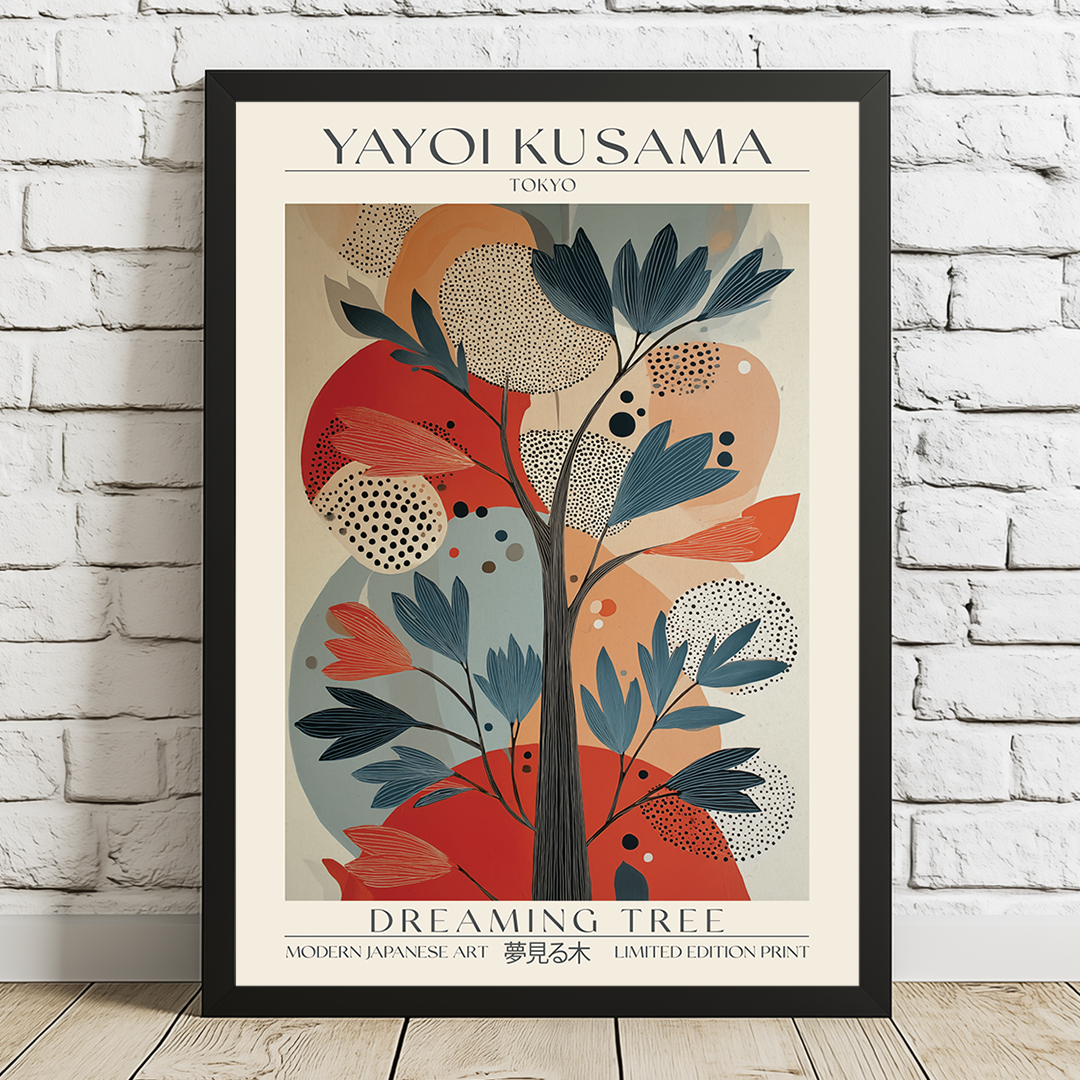 Framed Yayoi Kusama art print titled 'Dreaming Tree' on a white brick wall.