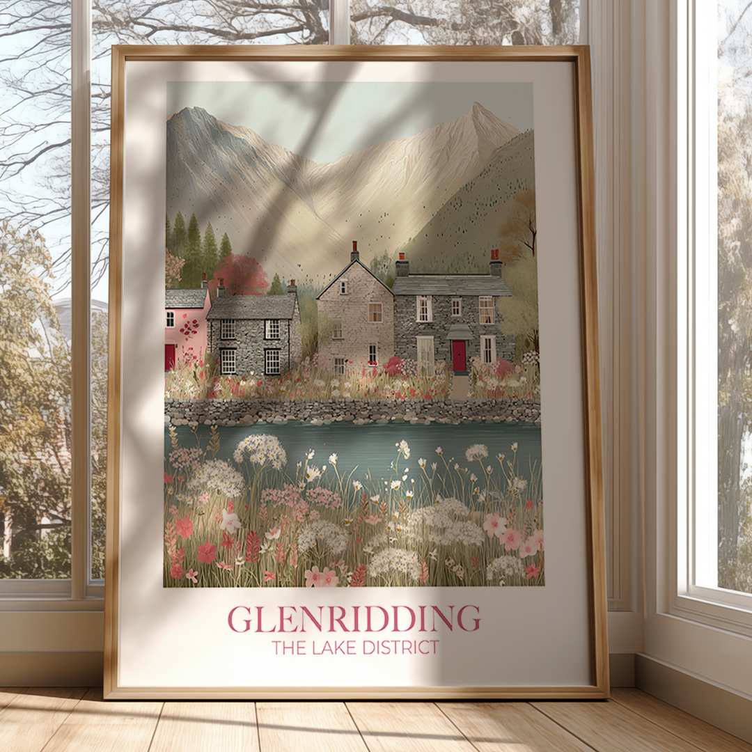 Framed artwork of a scenic village with mountains and flowers, titled 'Glenridding The Lake District'.
