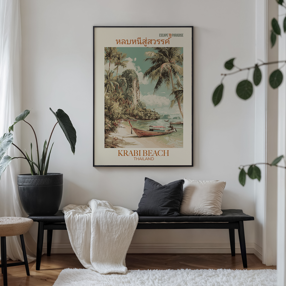 Framed Krabi Beach Thailand poster on a wall above a bench with cushions.