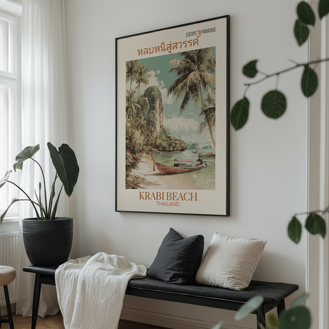 Framed Krabi Beach Thailand poster on a wall above a bench with cushions.