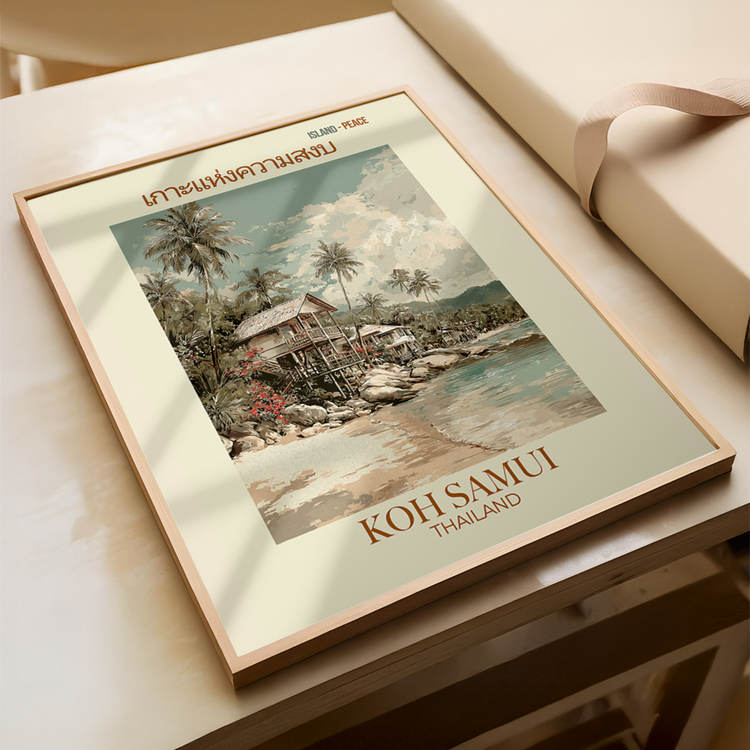 Framed artwork of a tropical scene with 'Koh Samui, Thailand' text on a wooden surface.