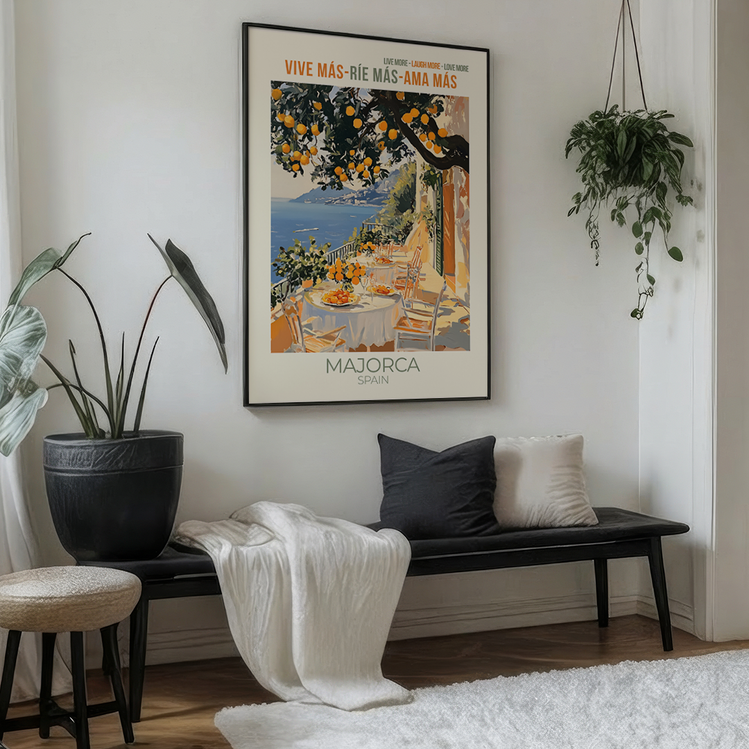 Living room with a bench, cushions, and a framed poster of Majorca, Spain.