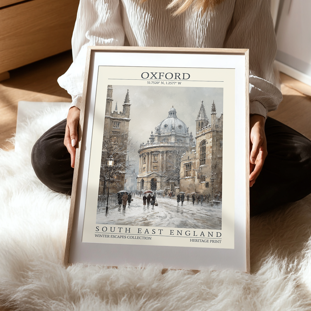 Person holding a framed print of Oxford, South East England
