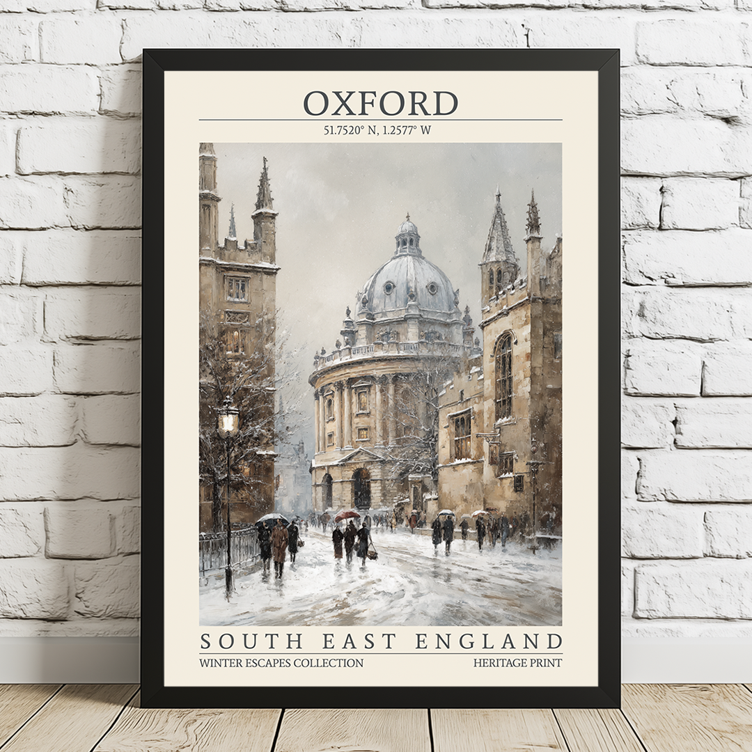 Framed print of a snowy street scene with historic buildings in Oxford, South East England.