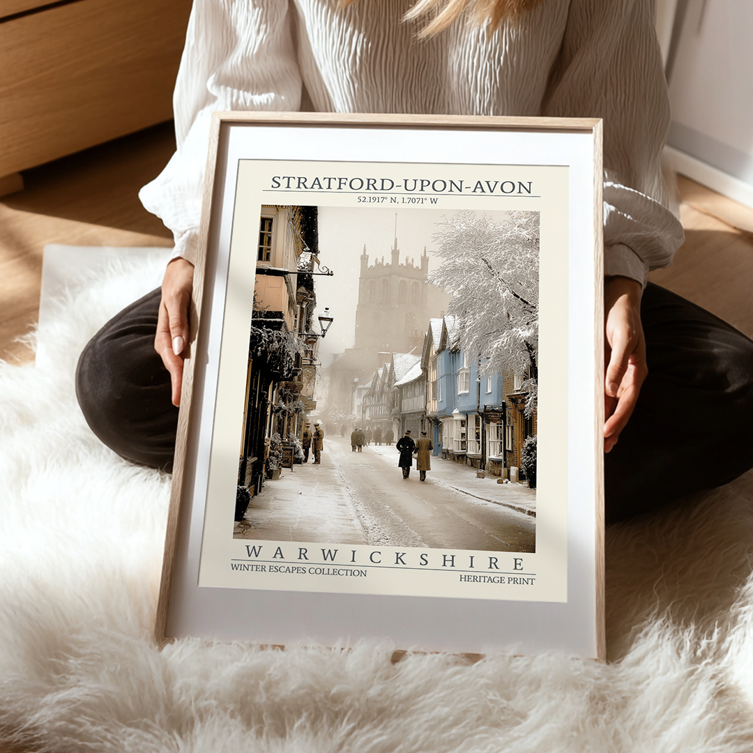 Person holding a framed print of Stratford-upon-Avon, Warwickshire.