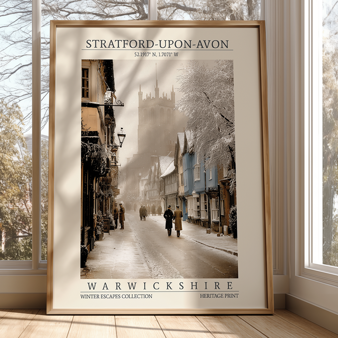 Framed print of a snowy street scene in Stratford-upon-Avon, Warwickshire, with a wooden frame.