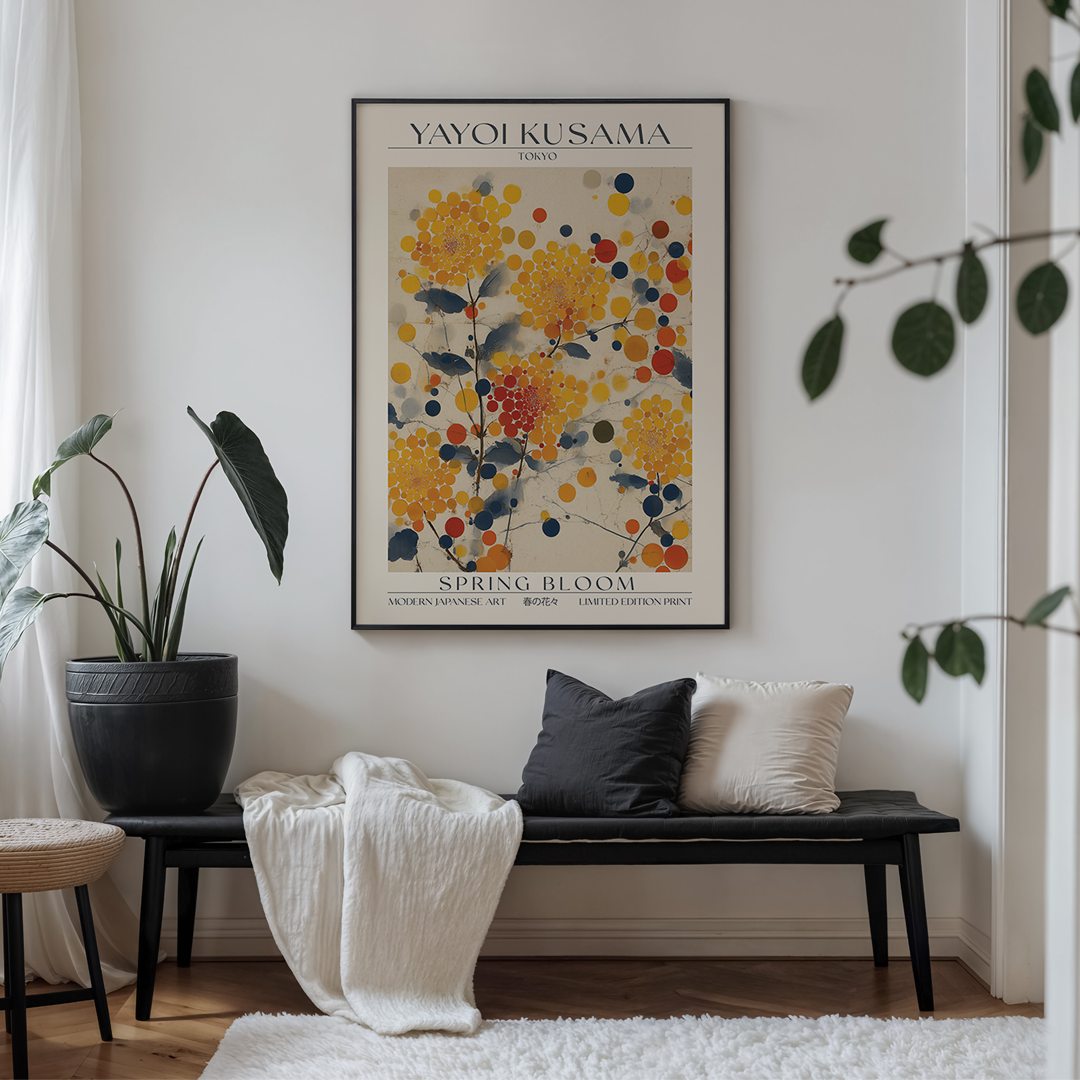 Living room with a bench, cushions, and a Yayoi Kusama 'Spring Bloom' poster on the wall.