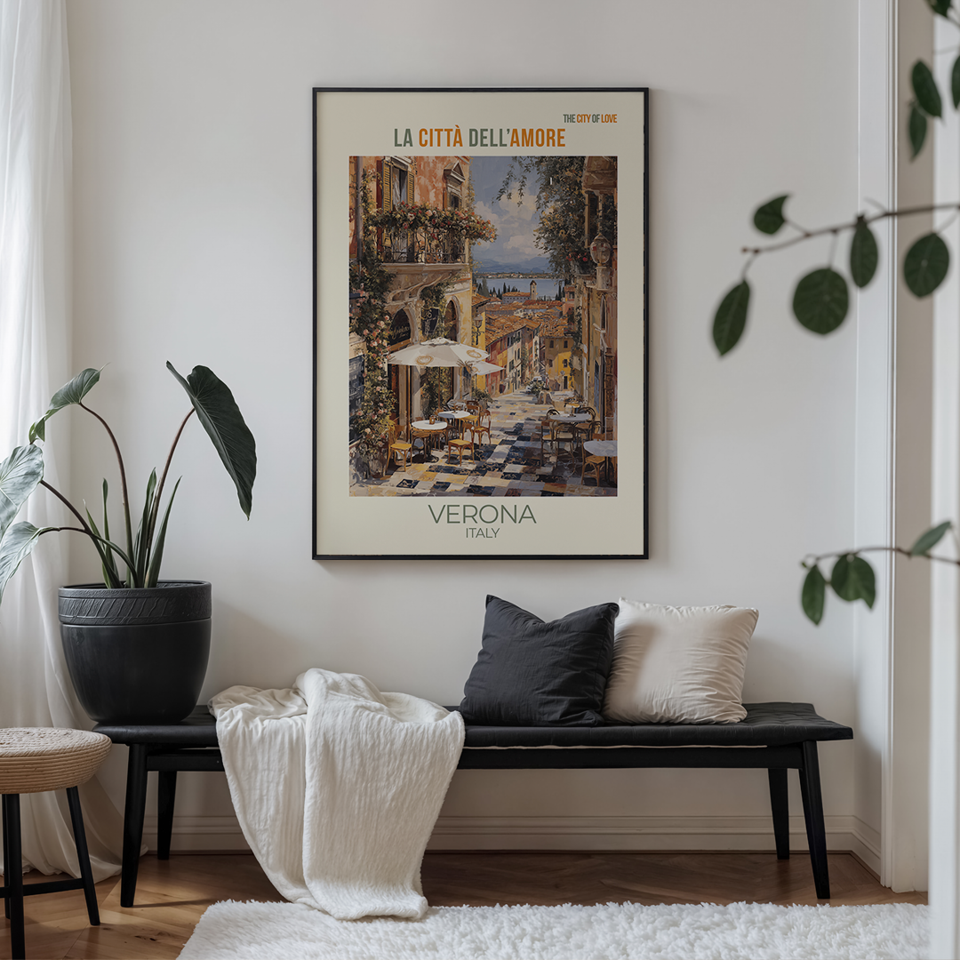 Poster of Verona on a wall above a bench with cushions in a living room.